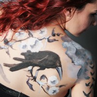 crow on a branch non-nude body painting idea