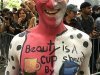 Well color me surprised! More than 100 New Yorkers strip off to celebrate body painting day