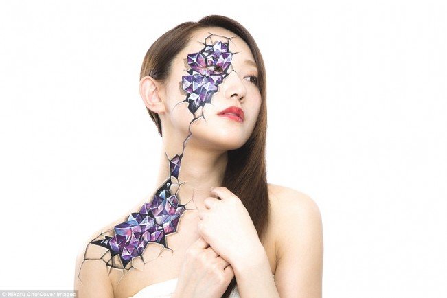 Japanese artist creates incredible optical illusions using women's BODIES as her canvas seeing them turned into animals, insects and robots